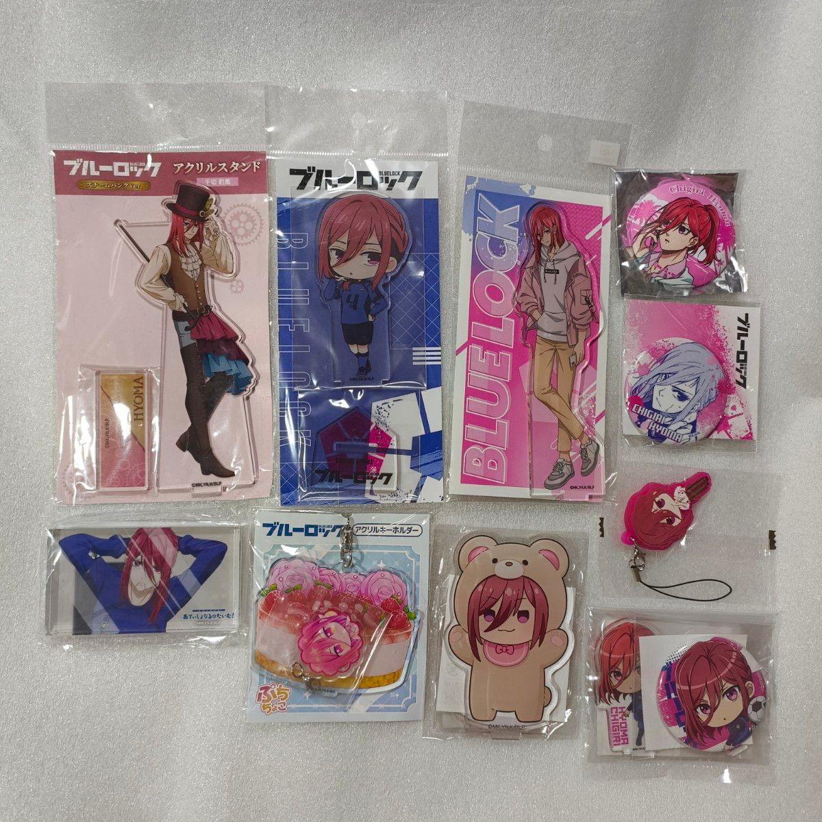 Blue Lock 10 items: Chigiri Hyōma acrylic stand, acrylic block, can badge, keychain—sold as a bundle; chigiri 0